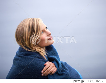 Closeup, woman and outdoor with blanket for thinking with smile, wellness and contemplate for leisure. Holiday, reflect with memories in nature for happiness, relax and healthy mindset with vacation Closeup, woman and outdoor with blanket for thinking with smile, wellness and contemplate for leisure. Holiday, reflect with memories in nature for happiness, relax and healthy mindset with vacation 139860237