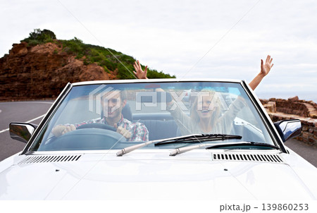 Couple, driving and convertible or excited or travel on mountain road or weekend trip, adventure or journey. Man, woman and transportation on hill in California or summer tourism, holiday or vacation Couple, driving and convertible or excited or travel on mountain road or weekend trip, adventure or journey. Man, woman and transportation on hill in California or summer tourism, holiday or vacation 139860253