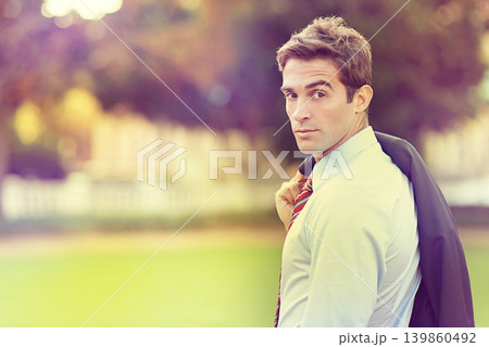 Business, travel and portrait of man in park with confidence, attitude or positive mindset. Career, focus and salesman portrait with jacket in forest for meeting, opportunity or appointment in nature 139860492