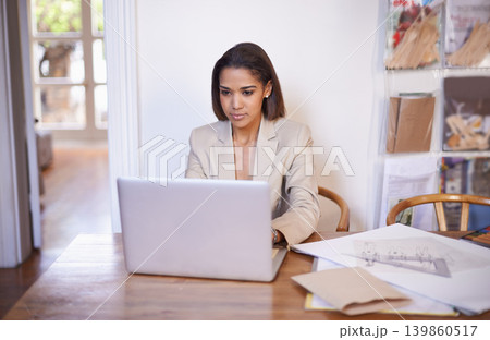 Black woman, table and typing on laptop for small business, work from home and thinking of idea to design. African female owner, technology and research for styling, career and entrepreneur. Black woman, table and typing on laptop for small business, work from home and thinking of idea to design. African female owner, technology and research for styling, career and entrepreneur. 139860517