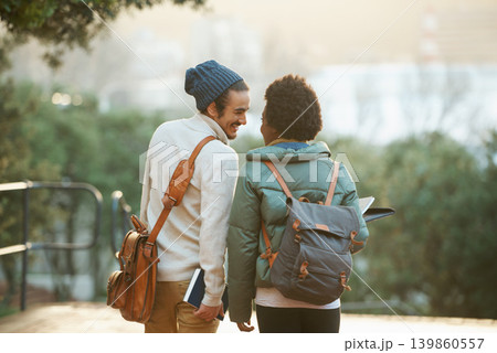 College students, couple and walk in sunset, campus and bags for class and notebooks. Man, woman and smile for university, homework and cozy in winter season to study, embrace and date for academic College students, couple and walk in sunset, campus and bags for class and notebooks. Man, woman and smile for university, homework and cozy in winter season to study, embrace and date for academic 139860557