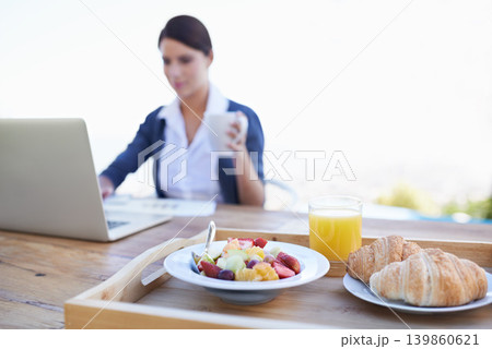 Food, laptop and breakfast outdoor, woman and table with healthy meal, freelancer and online. Person, worker and writing with technology, pc and creative with coffee in remote work and business Food, laptop and breakfast outdoor, woman and table with healthy meal, freelancer and online. Person, worker and writing with technology, pc and creative with coffee in remote work and business 139860621