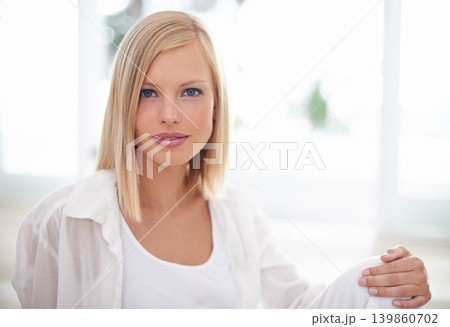 Relax, calm and portrait of woman in living room for peace, comfortable and self care. Health, zen and weekend with face of a young female person at home for confidence, morning and apartment Relax, calm and portrait of woman in living room for peace, comfortable and self care. Health, zen and weekend with face of a young female person at home for confidence, morning and apartment 139860702