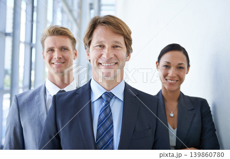 Teamwork, office and portrait of happy business people for pride, confidence and collaboration in hallway. Corporate lawyers, professional and men and woman for partnership, leadership and about us 139860780