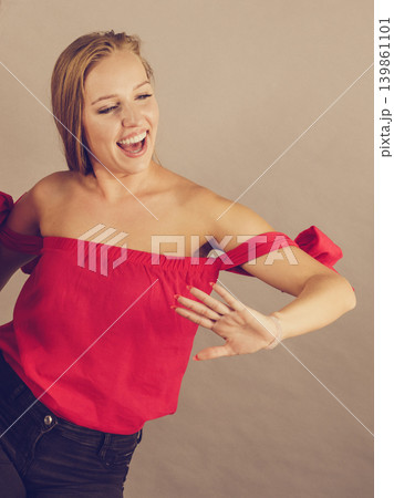 Happy young blonde woman 139861101