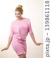 Woman wearing pink elegant dress 139861118
