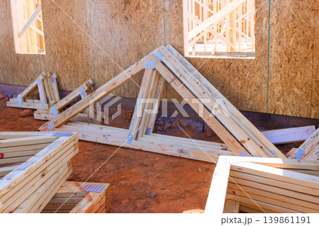 Workers prepare wooden frames at construction site beams framing happens 139861191