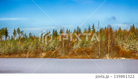 bright winter Sunny forest with snow and fir trees and lake bright winter Sunny forest with snow and fir trees and lake 139861322