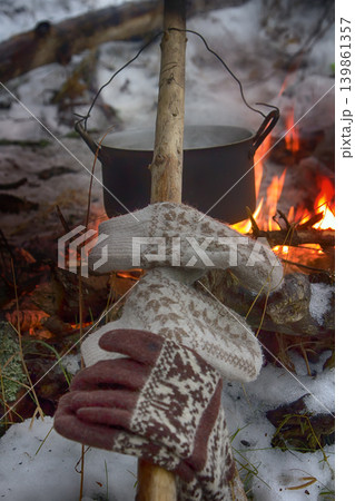 picnic in winter on nature of a bonfire 139861357