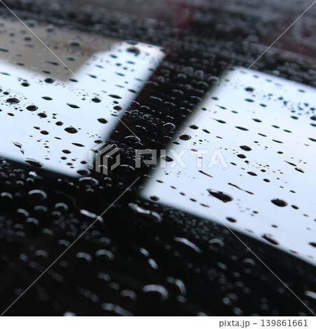 Droplets Pattern Of Anti Rain Repellent On Black Car Roof Square Stock Photo Droplets Pattern Of Anti Rain Repellent On Black Car Roof Square Stock Photo 139861661