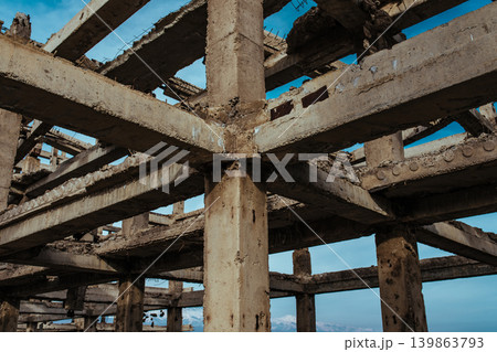 Abandoned concrete structure on blue sky background Abandoned concrete structure on blue sky background 139863793