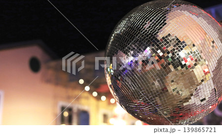 Shimmering Mirror Disco Ball At Night Shimmering Mirror Disco Ball At Night 139865721