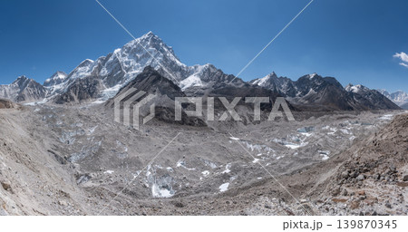 Panorama view of Khumbu glacier with others Himalayas peak in the background can seen while trekking nearly Everest base camp, Nepal. 139870345