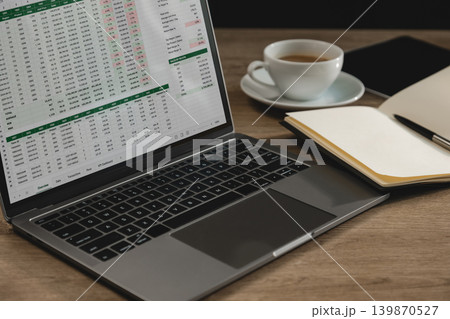 Laptop displaying spreadsheet documents with financial tables and online business reports on workspace desk, supporting data analysis, accounting workflow, project monitoring, and digital reporting. Laptop displaying spreadsheet documents with financial tables and online business reports on workspace desk, supporting data analysis, accounting workflow, project monitoring, and digital reporting. 139870527