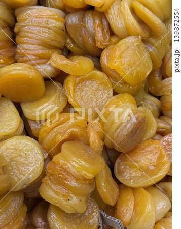 Dried apricots closeup texture for healthy food background Dried apricots closeup texture for healthy food background 139872554