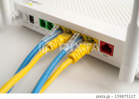 Ethernet cable with wireless router connect to internet service provider network. 139875127