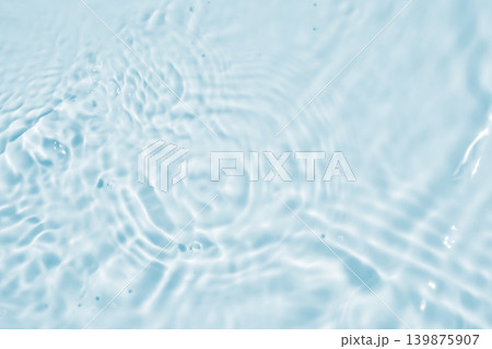 Abstract transparent water shadow surface texture natural ripple on blue background Abstract transparent water shadow surface texture natural ripple on blue background 139875907