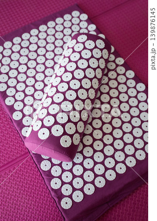 Close up of acupressure mat spikes. Alternative china medicine. Close up of acupressure mat spikes. Alternative china medicine. 139876145