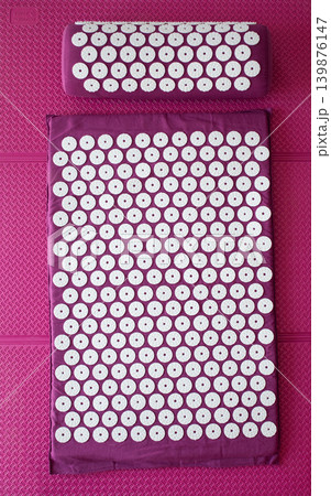 Close up of acupressure mat spikes. Alternative china medicine. Close up of acupressure mat spikes. Alternative china medicine. 139876147