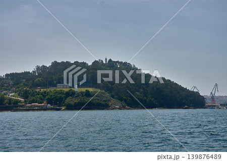 Panoramic view of the iconic Monte de la Guia from a boat sailing in the Vigo estuary Panoramic view of the iconic Monte de la Guia from a boat sailing in the Vigo estuary 139876489