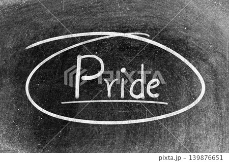 White chalk hand writing in word pride and circle shape on blackboard background 139876651