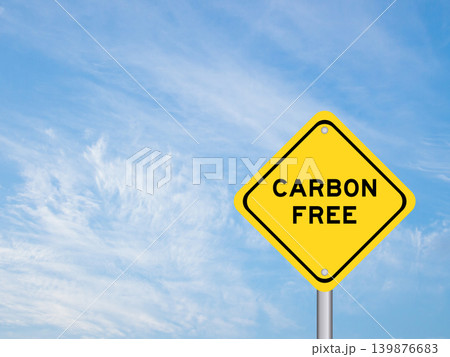 Yellow transportation sign with word carbon free on blue color sky background 139876683
