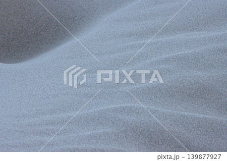 Textured ripple effect on frozen sand dune background 139877927