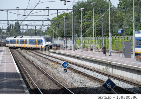 Railway Yard with Trains and Overhead Power Lines Railway Yard with Trains and Overhead Power Lines 139880596