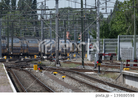 Railway Yard with Trains and Overhead Power Lines Railway Yard with Trains and Overhead Power Lines 139880598