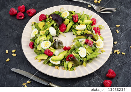 Healthy Asparagus and Avocado Salad with Quail Eggs and Fresh Raspberries Healthy Asparagus and Avocado Salad with Quail Eggs and Fresh Raspberries 139882354