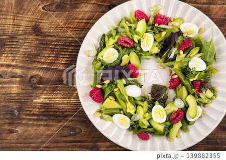Spring Salad with Avocado, Asparagus, Quail Eggs and Pine Nuts Spring Salad with Avocado, Asparagus, Quail Eggs and Pine Nuts 139882355