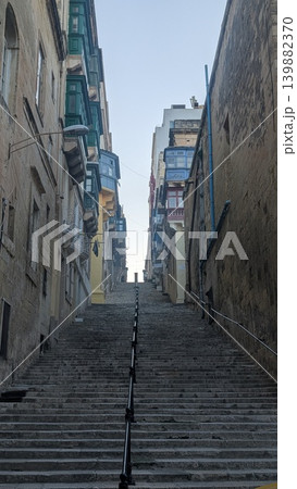Cityscape of the long stairs of narrow street in the old city 139882370