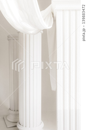 Minimalist studio composition with white classical columns, fallen pillar, white curtains Minimalist studio composition with white classical columns, fallen pillar, white curtains 139883472