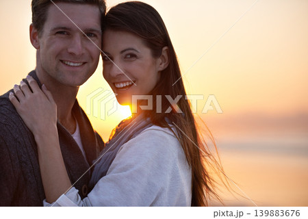 Couple hug, portrait and sunset on beach, travel for bonding and romance outdoor with love and trust. Happiness, support and loyalty with people in relationship, mockup space and adventure together Couple hug, portrait and sunset on beach, travel for bonding and romance outdoor with love and trust. Happiness, support and loyalty with people in relationship, mockup space and adventure together 139883676