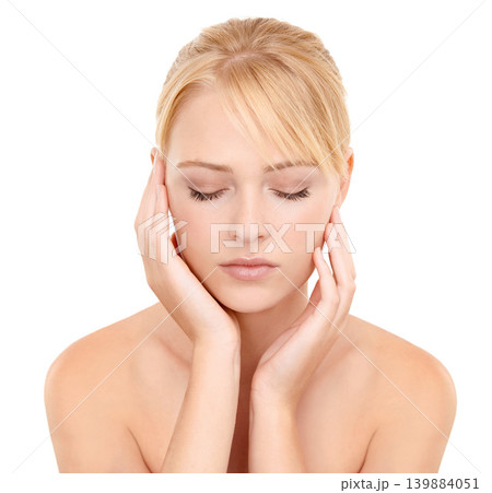 Skincare, health and woman in studio with natural, beauty and wellness face routine. Cosmetic, confident and young female person with facial dermatology treatment for glow by white background. Skincare, health and woman in studio with natural, beauty and wellness face routine. Cosmetic, confident and young female person with facial dermatology treatment for glow by white background. 139884051