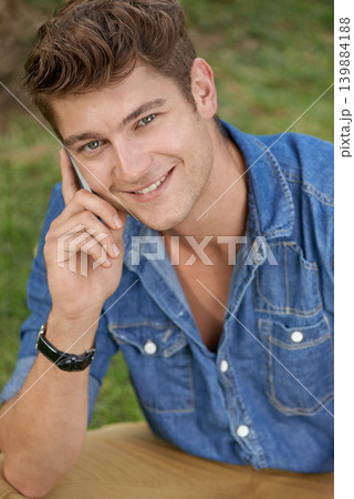 Portrait, phone call and smile of man at park for conversation, discussion or listening to news. Face, cellphone and happy person in connection with contact, chat and communication outdoor at garden Portrait, phone call and smile of man at park for conversation, discussion or listening to news. Face, cellphone and happy person in connection with contact, chat and communication outdoor at garden 139884188