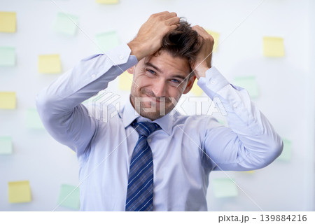 Portrait, burnout and man with business, headache and employee with anxiety, tax and pain. Face, person and worker with migraine or stress with audit or depression with accountant, mistake or startup Portrait, burnout and man with business, headache and employee with anxiety, tax and pain. Face, person and worker with migraine or stress with audit or depression with accountant, mistake or startup 139884216
