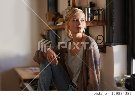 Calm, thinking and woman relax in a house with peaceful, memory or moment of reflection. Remember, insight and female person in a living room chilling, curious or enjoy weekend , Saturday or me time Calm, thinking and woman relax in a house with peaceful, memory or moment of reflection. Remember, insight and female person in a living room chilling, curious or enjoy weekend , Saturday or me time 139884385