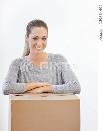 Portrait, moving and woman with a box, home and model isolated on a white studio background. Face, person and girl with property and real estate with renovation and achievement with package or parcel Portrait, moving and woman with a box, home and model isolated on a white studio background. Face, person and girl with property and real estate with renovation and achievement with package or parcel 139884409