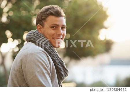 Portrait, man and outdoor for fashion in smile on urban town with confidence, happy and travel in winter with style. Outfit, clothes and trends for cold weather, trip and holiday in New York. 139884451