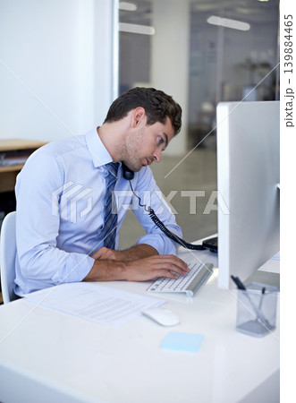 Businessman, phone call and computer in office or client communication or online sales, internet or networking. Male person, telephone and typing in New York company or job, discussion or connection Businessman, phone call and computer in office or client communication or online sales, internet or networking. Male person, telephone and typing in New York company or job, discussion or connection 139884465