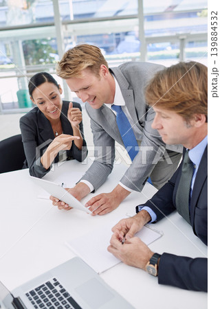 Business people, tablet and research for finance in office, collaboration and unity for proposal. Coworkers, workplace and teamwork or accountants for planning, support and paperwork for budget Business people, tablet and research for finance in office, collaboration and unity for proposal. Coworkers, workplace and teamwork or accountants for planning, support and paperwork for budget 139884532