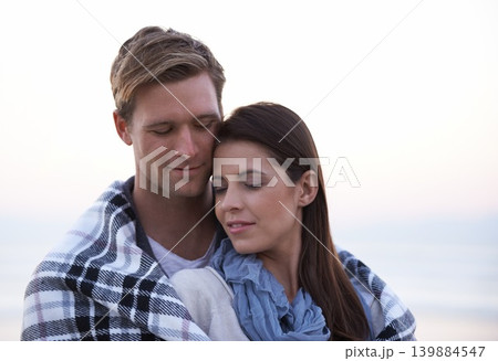 Couple, love and embrace outdoor with blanket together on holiday in Florida with sky background. Travel, vacation and man hug woman on date in summer with care, support and kindness in marriage 139884547