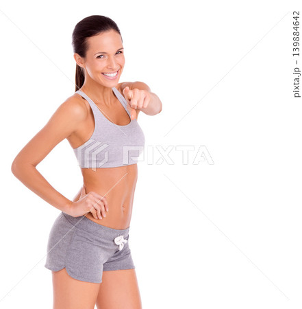 Studio, happy woman and pointing in portrait for fitness promotion and exercise announcement in mockup. Model, face or congratulations to winner of aerobics program or gym offer by white background Studio, happy woman and pointing in portrait for fitness promotion and exercise announcement in mockup. Model, face or congratulations to winner of aerobics program or gym offer by white background 139884642