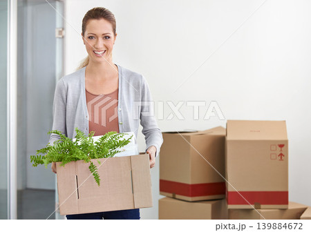 Portrait, new home and woman with boxes, real estate and house on a loan with rental apartment and property. Person, plant and girl with achievement and development with package, mortgage and moving Portrait, new home and woman with boxes, real estate and house on a loan with rental apartment and property. Person, plant and girl with achievement and development with package, mortgage and moving 139884672