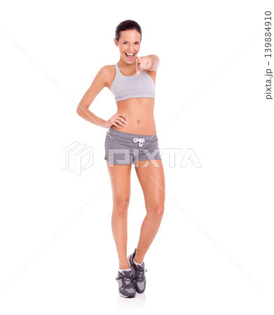 Studio, woman and pointing in portrait for fitness promotion and exercise announcement or news of gym discount. Model, happy face and aerobics offer to winner and workout plan by white background 139884910