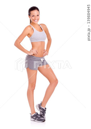 Studio, woman and confident in portrait for fitness with smile, exercise and commitment by white background. Spain model, happy face and workout with aerobics for health and training for strong body 139884945