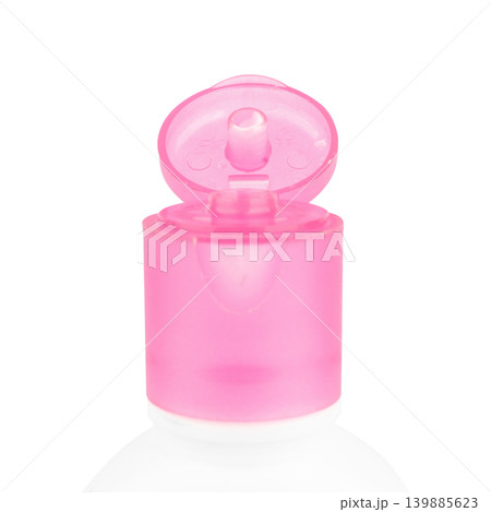 lotion bottle isolated open lid closeup color pink isolated on white background lotion bottle isolated open lid closeup color pink isolated on white background 139885623