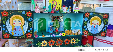 Close up of miniature puppet theater scenery showing traditional artistic design, cultural research  139885881