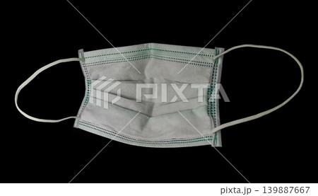 Protective face mask isolated on black background Protective face mask isolated on black background 139887667